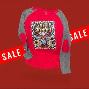 Woman size medium long sleeve cotton/poly blend new rock shirt